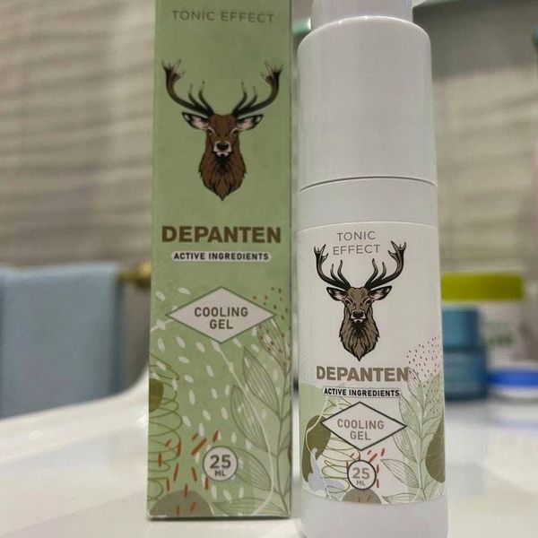 Flacone airless bianco di Depanten con la scatola verde e il cervo